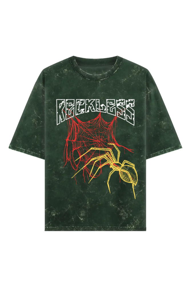 Green distressed short-sleeve T-shirt with 'RECKLESS' text, red spider web, and yellow spider graphic